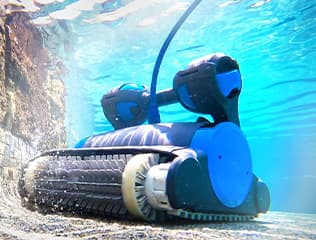 Removing fine sand from a pool floor with a robotic cleaner