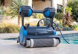 Dolphin Premier Robotic Pool Cleaner with Multi-Media, Oversized Leaf Bag, & 3 Year Warranty robotic pool cleaner cleaning a backyard pool